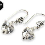 Silver Drop Dangle Heart CZ Crystal Earrings this exquisite earring captivates with its timeless elegance.