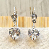 Silver Drop Dangle Heart CZ Crystal Earrings this exquisite earring captivates with its timeless elegance.